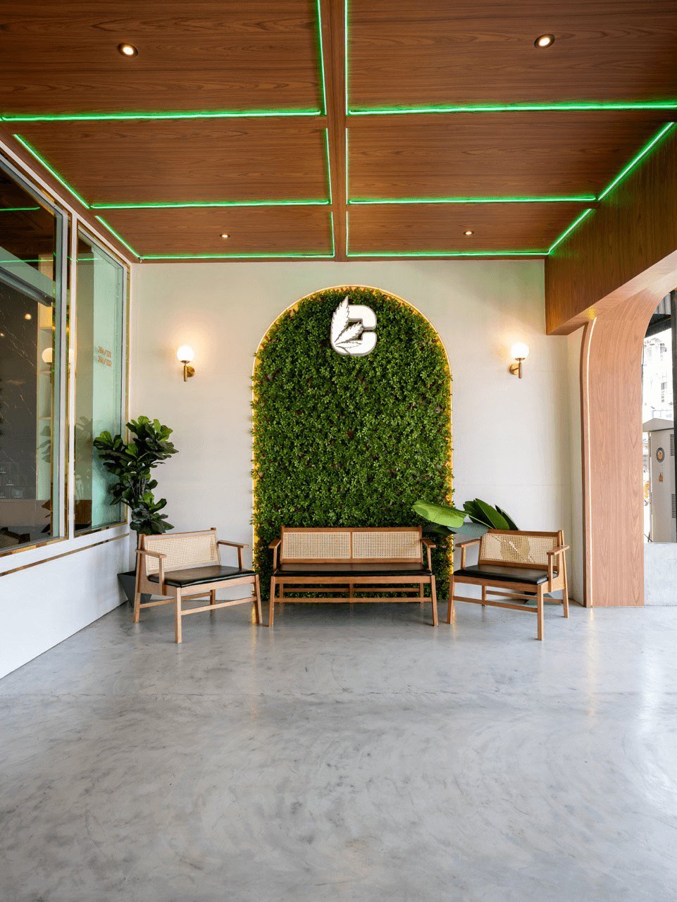 CannaBuri storefront entrance with the green plant wall and logo, Pattaya 3rd Road